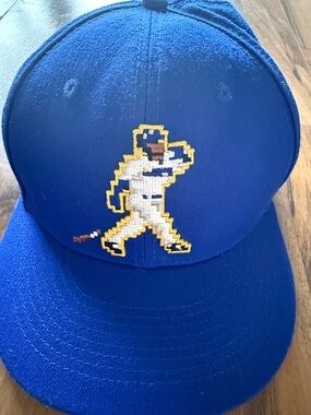 Blue Baseballism  fitted Cap with 8 bit “ Ken Griffey Jr” logo.